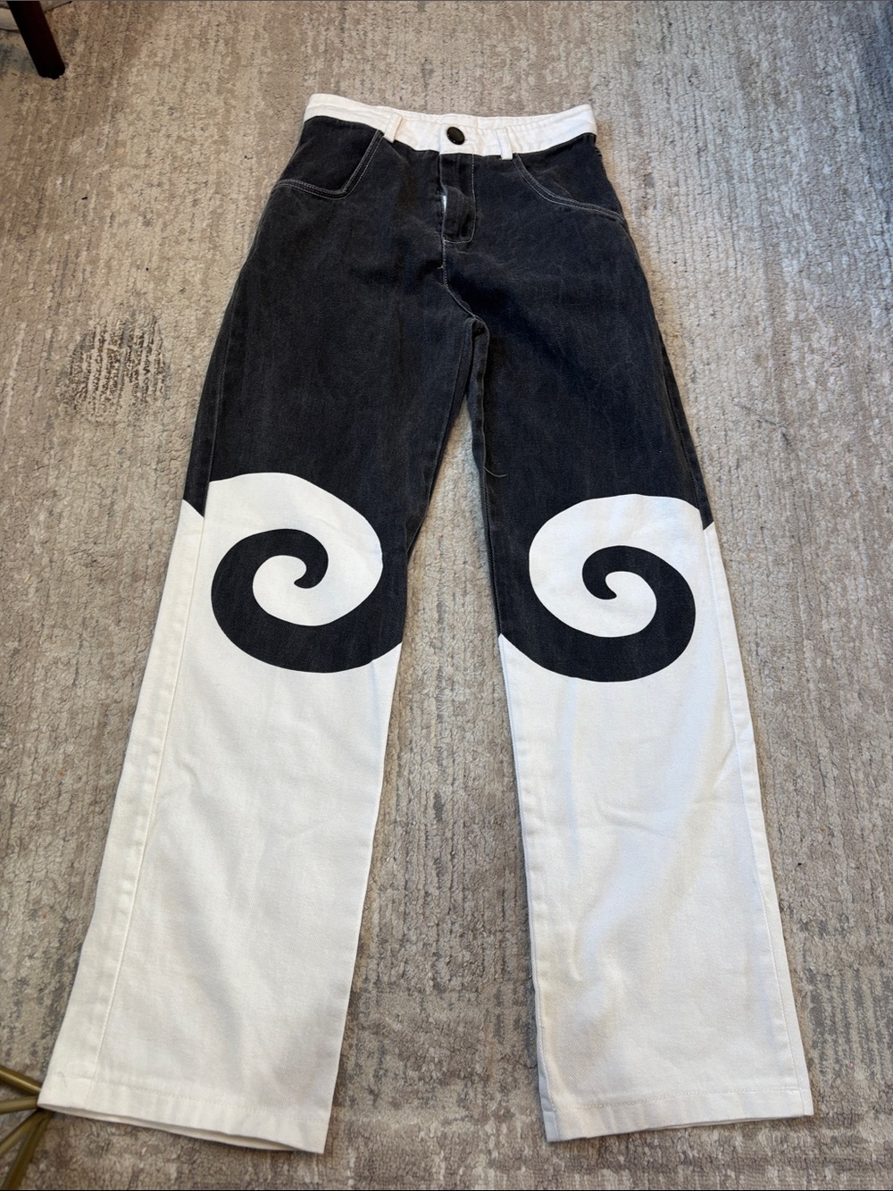 Two-Tone Black & White Straight-Leg Jeans with Graphic Swirl